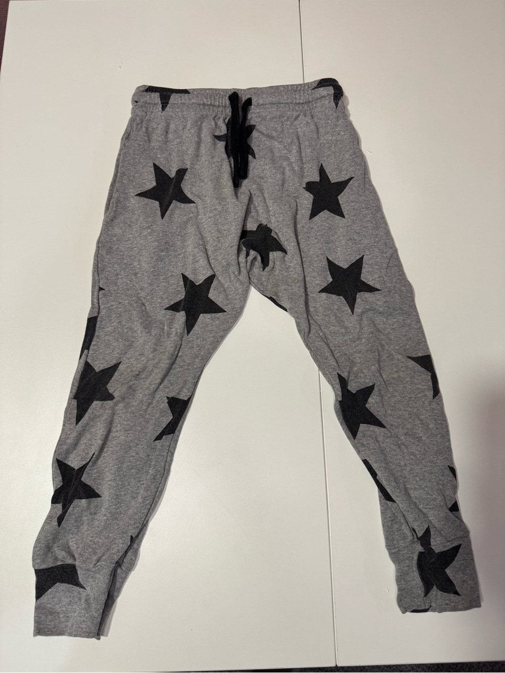 nununu Gray Sweatpants with Black Star Print